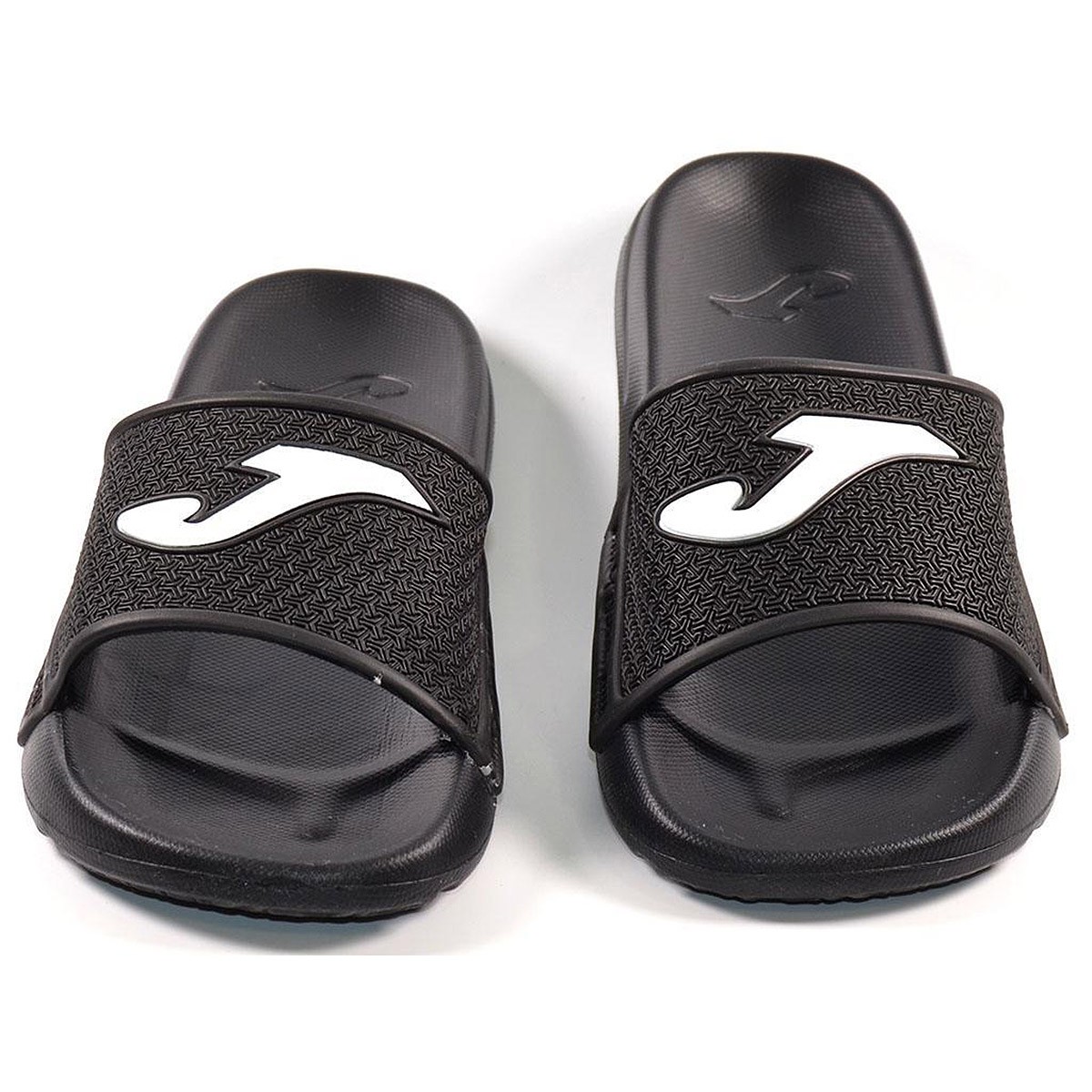 Islandjr2101 Joma Chancla Comprar chancla de goma con grabado en pala y forro interior textil.Suela de caucho muy ligera y flexi