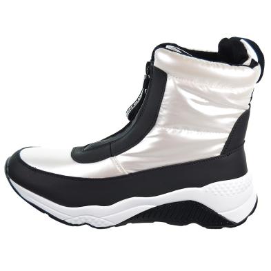 25031 DNG Botín en sintético y textil acolchado con cremallera, forrado y plantilla en textil acolchado. Suela en poliuretano.