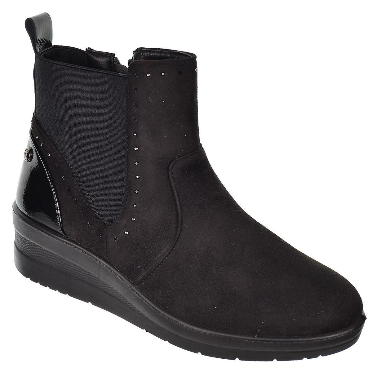 22409 Amarpies Botín antelina. Talón charol. elásticos y cremallera. Forro textil y plantilla acolchado extraíble. Cuña